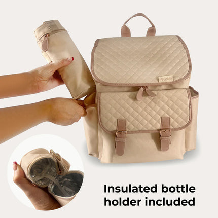 blush quilted backpack showing the insulated bottle holder and how it fits into the side pocket of the bag.