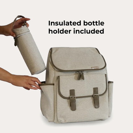 Oatmeal changing backpack from My Babiie showing how the insulated bottle holder goes into the side pocket.