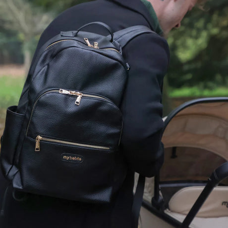 Changing Backpack with Gold detailing as worn by dad.
