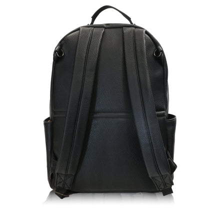 The back of the Black Changing Backpack showing the adjustable straps, top grab handle and side pockets. 