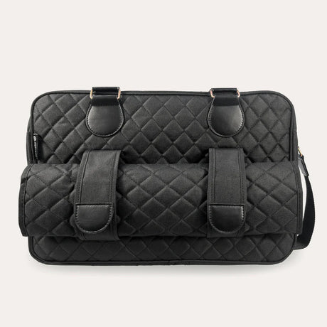 Image showing the back of the shoulder bag with 2 loophols for the changing mat to be stored.