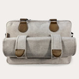Image showing the back of the bag where 2 loop clips hold the changing mat.