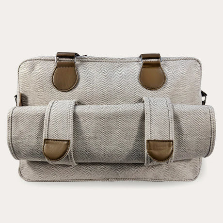 Image showing the back of the bag where 2 loop clips hold the changing mat.